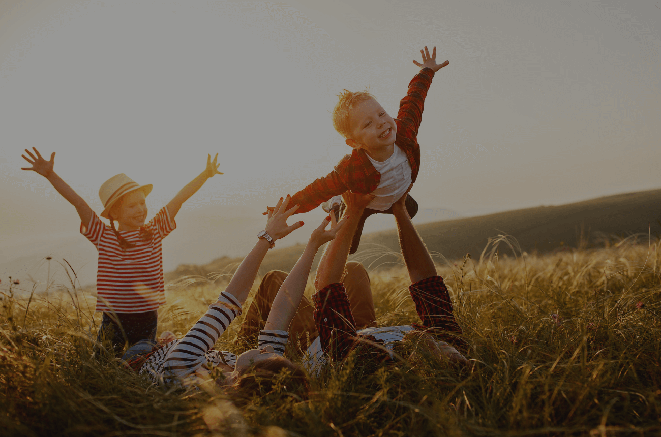 Family enjoying summer vacation and cruise travel with REAL Transfers.