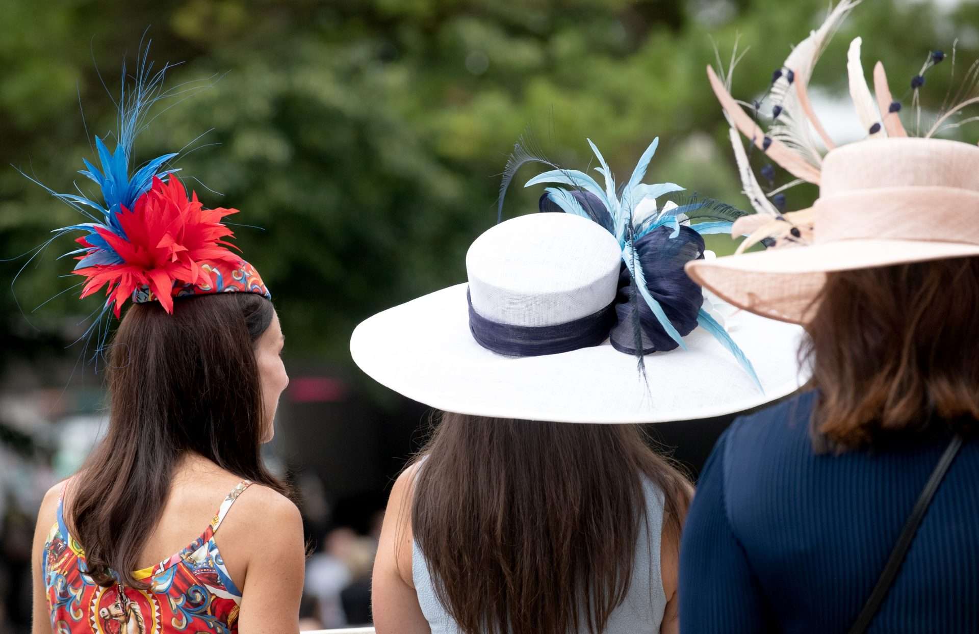 Elegant hats at Royal Ascot and other summer sporting events, chauffeur travel.